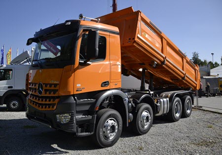 Large Orange dumpster rental truck